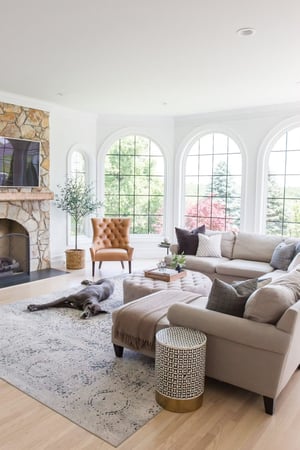 the arched manor living room with picture and specialty windows