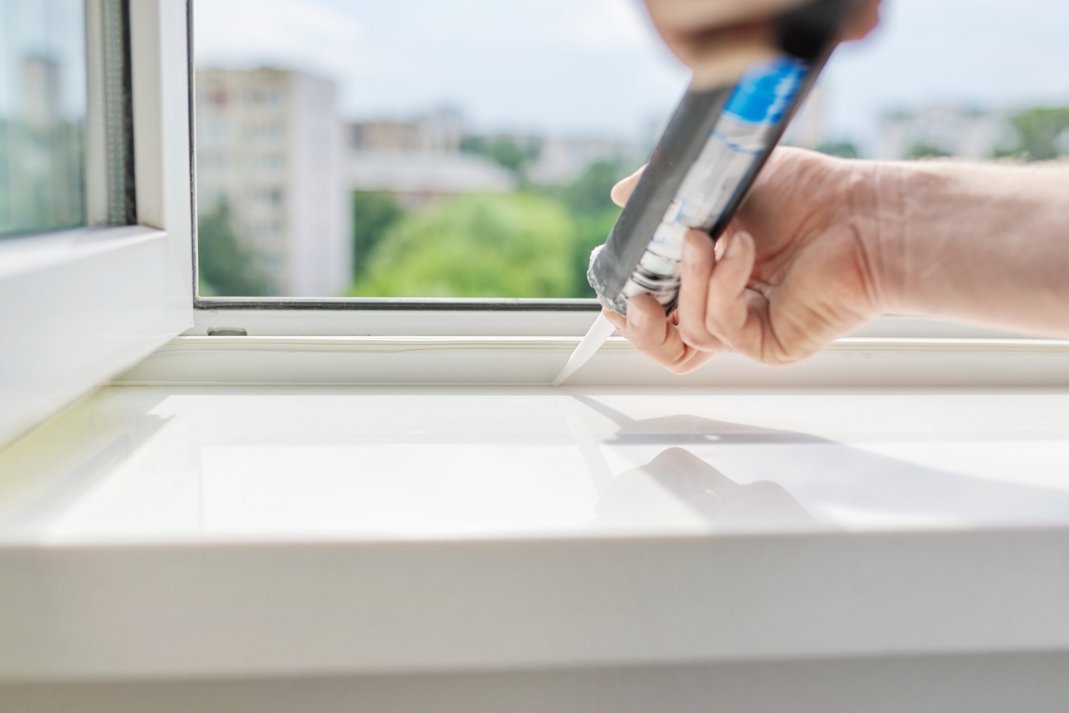 calking a window