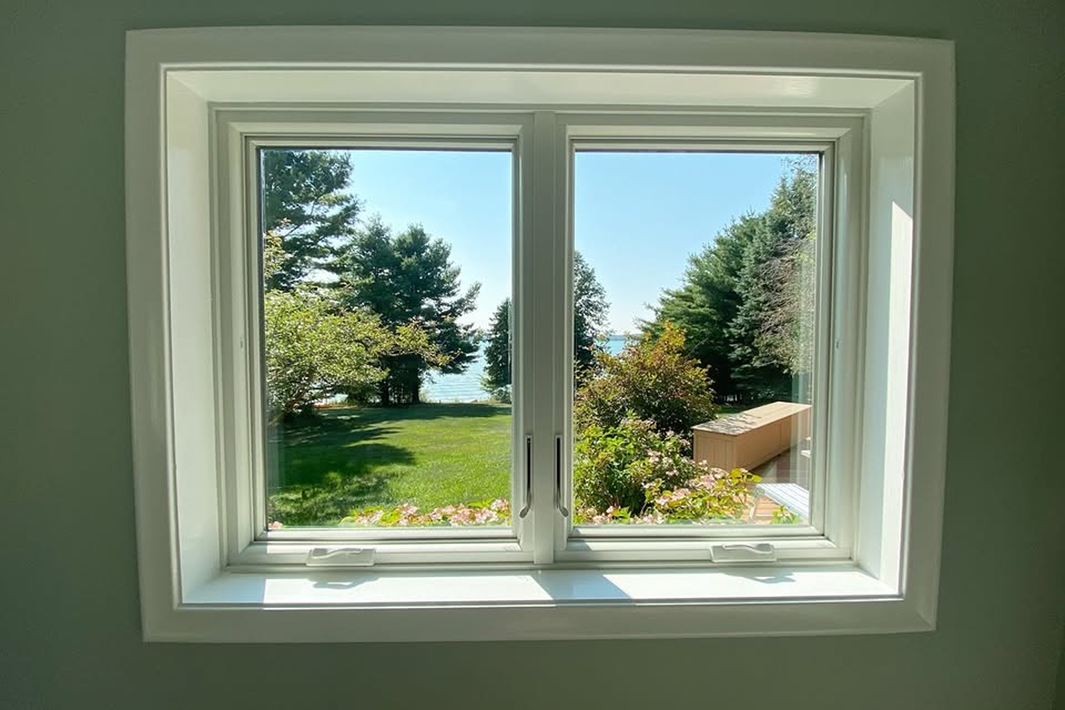 Egress casement window in a basement bedroom.