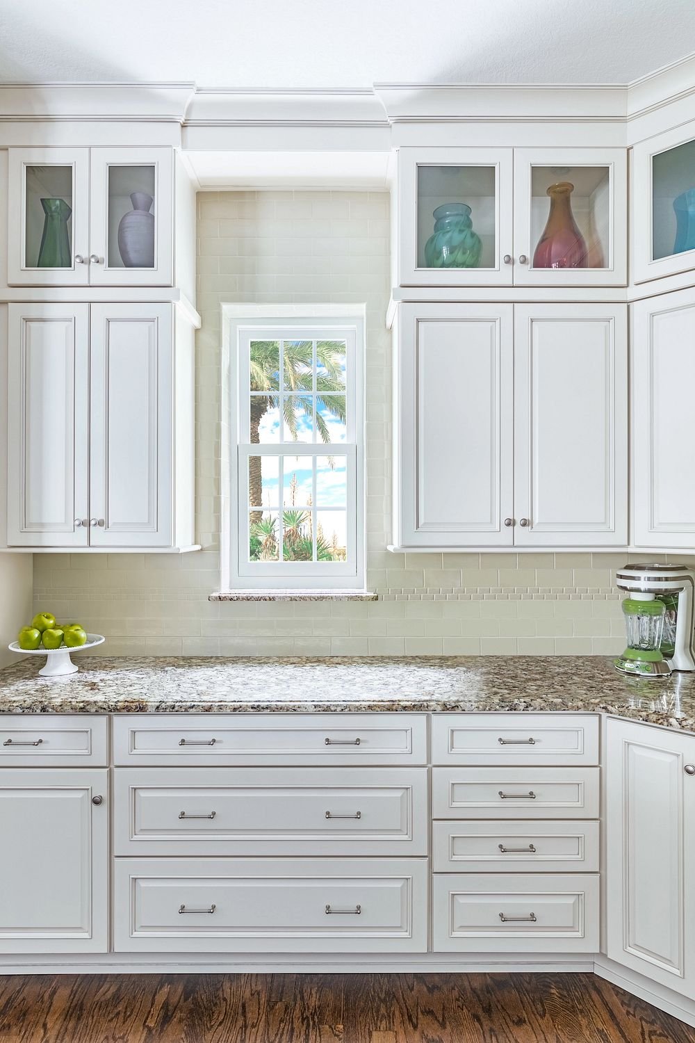 a tall double hung window in a coastal home.