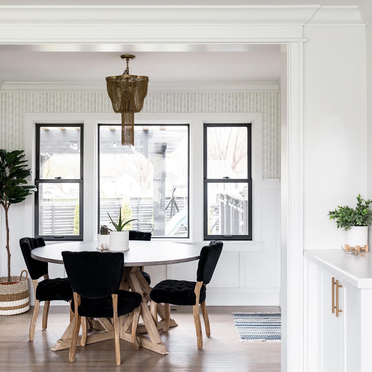 Black double hungs with no grilles and a picture window