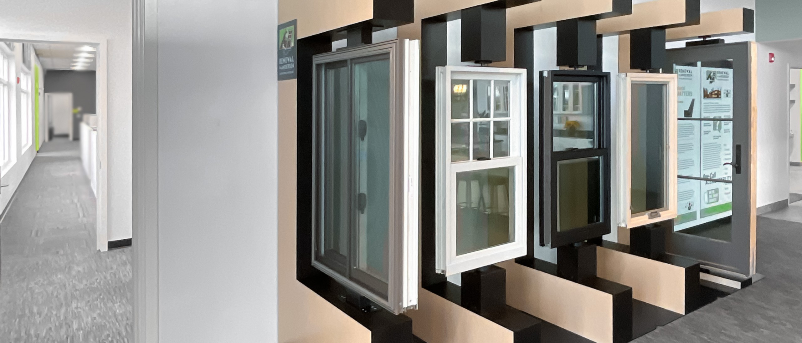 A selection of window frames on display in a showroom.