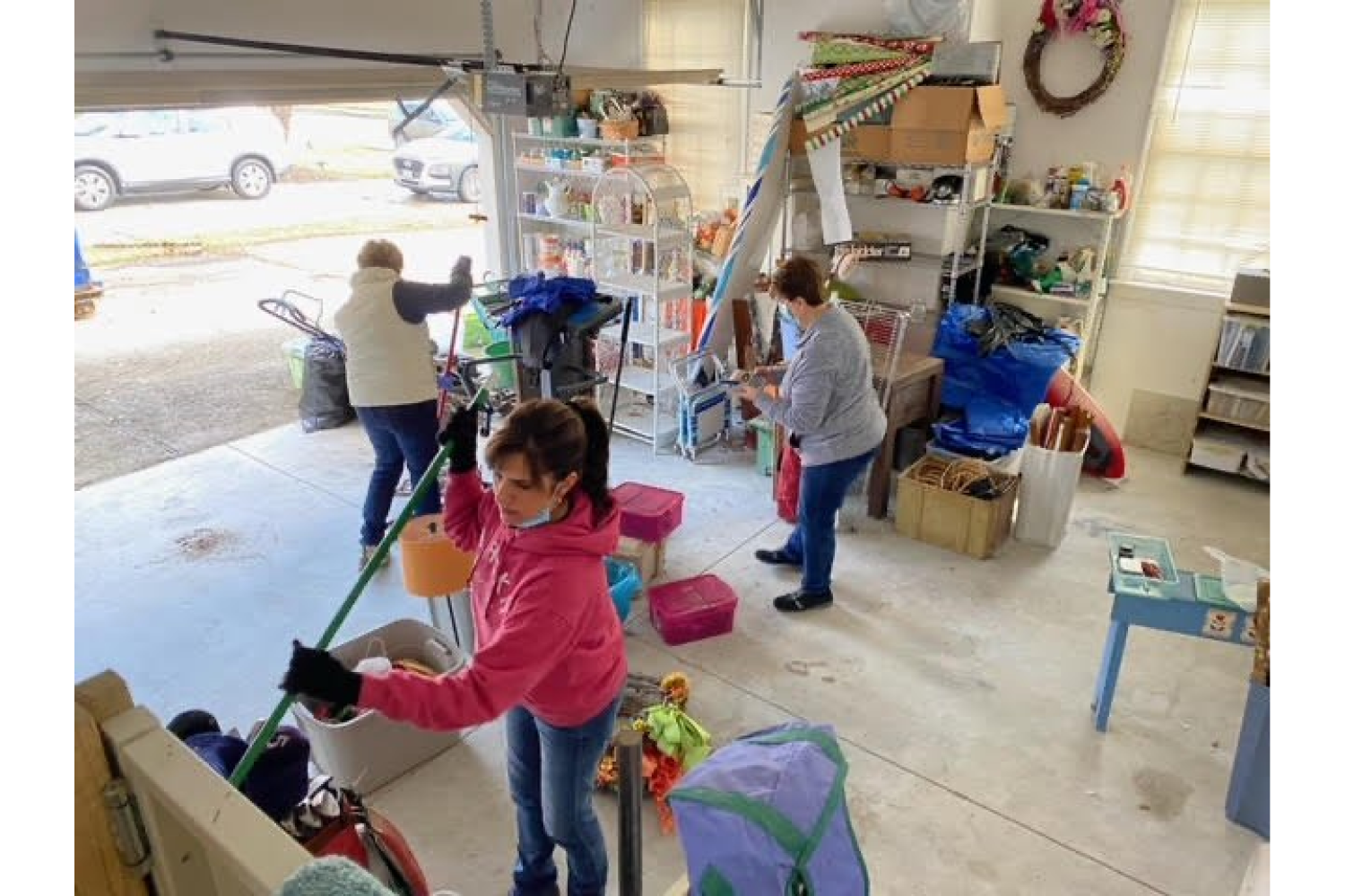 RbA of Virginia beach members assisting the Park family by cleaning, organizing their home