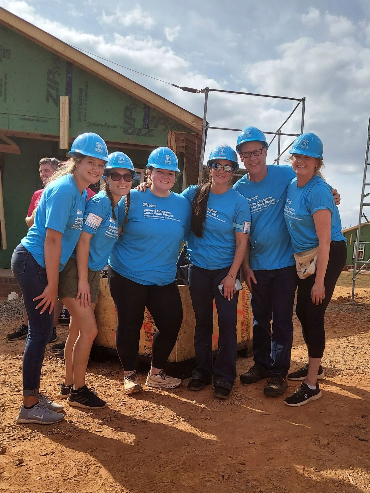 Renewal by Andersen volunteers work on Habitat for Humanity Carter Project